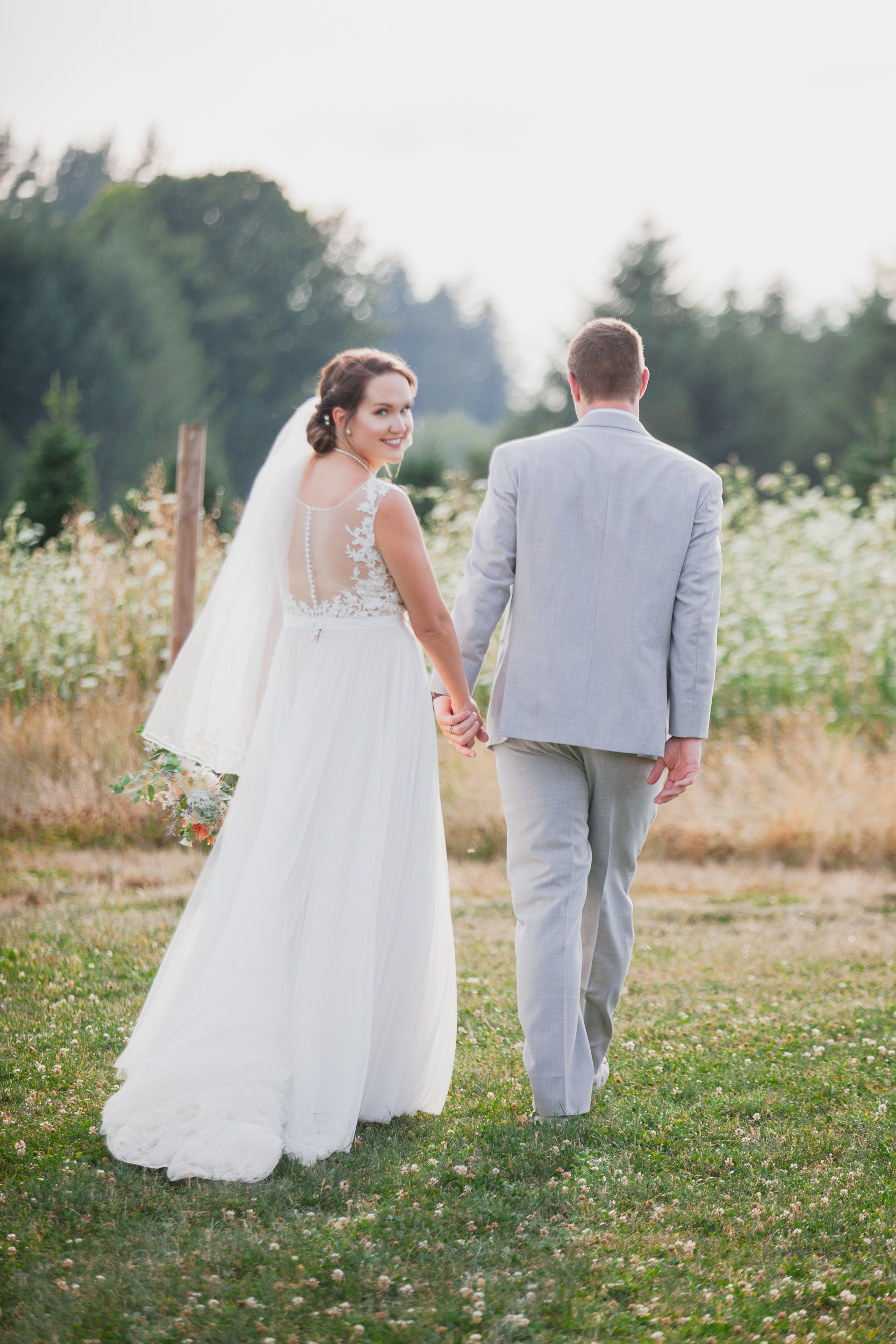 Wedding couple at a summer wedding at Adelaide Farm photographed by Portland based photographer